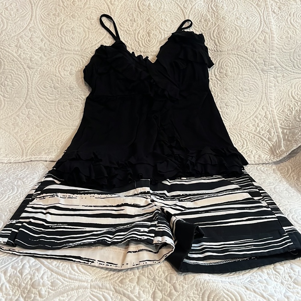 Black and white shorts and black top,‎ size medium top and size 4 shorts